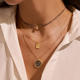 Close-up of the Magic in Moonlight Necklace being worn, highlighting the intricate design of the crescent moon and star, making it a beautiful talisman and piece of spiritual jewelry for meditation and personal transformation.