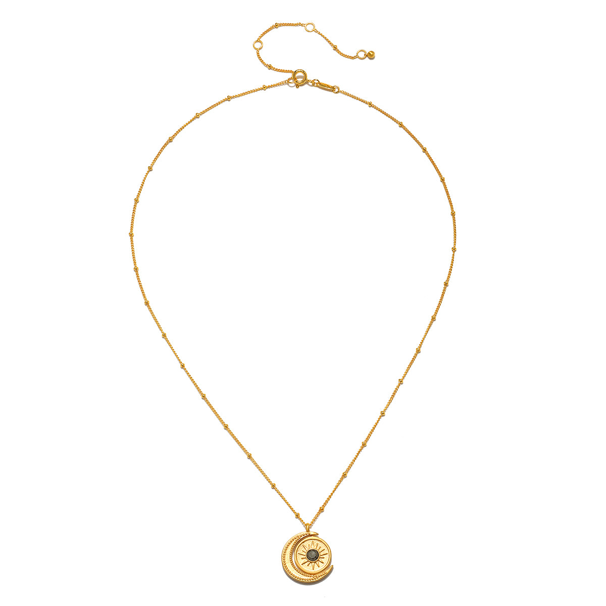 Back view of the United in Light Spinning Pendant Necklace showcasing an elegant chain and pendant. This spiritual jewelry piece incorporates sun and moon symbols, designed for protection and meaningful connections during meditation, yoga, and other spiritual practices.