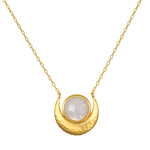 Cradled in Light Moonstone Necklace featuring a crescent moon design with a luminous moonstone, embodying spiritual jewelry meant for meditation and protection, connecting the essence of the sun and moon, symbolizing meaning and manifestation.