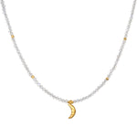 Awaken Intuition Moonstone Necklace featuring a golden crescent moon charm, symbolizing spiritual jewelry for intuition and protection, perfect for meditation and manifestation, embodying zodiac energies in a beautiful design that complements any yoga attire.