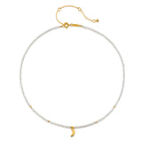Close-up of the Awaken Intuition Moonstone Necklace highlighting the delicate beadwork and crescent moon charm, ideal for those seeking spiritual jewelry that inspires meaning, manifestation, and connection to zodiac influences in their daily life.