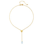 Flat lay of the Speak with Strength Chakra Lariat Necklace displaying its elegant design with blue topaz and gold plating, highlighting its meaning as spiritual jewelry and a meditation talisman for those seeking balance.