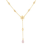 Gold lariat necklace with lotus pendant, pearl stations, and pink teardrop stone dangle.