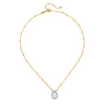 Enveloped in Protection Crystal Necklace featuring a stunning faceted teardrop of crystal quartz on an 18kt gold plated chain. This spiritual jewelry piece is perfect for meditation and serves as a talisman for protection, embodying meaning and significance for practitioners of yoga and manifestation. Ideal as part of a layered look, it resonates with the energies of the sun and moon, enhancing your spiritual journey and connection.
