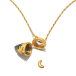 Open view of the Guiding Spirit Labradorite and White Topaz Lotus Locket Necklace, highlighting its spiritual significance, perfect for yoga practice and enhancing clarity during meditation and manifestation.