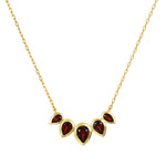 Ignite Strength Garnet Petal Necklace featuring five garnet lotus petals set in 18kt gold plate, a beautiful piece of spiritual jewelry symbolizing grounding energy and transformation, perfect for meditation and manifestation.