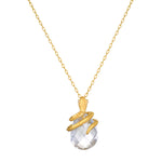 Manifest Rebirth White Topaz Snake Necklace displayed, featuring a coiled snake design in 18kt gold plate and a sparkling white topaz pendant, perfect for spiritual jewelry and meditation, symbolizing meaning and manifestation.