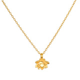 New Dawn Lotus Necklace featuring an 18kt gold plate lotus flower pendant, symbolizing new beginnings and transformation. This spiritual jewelry is perfect for meditation and serves as a talisman for protection and manifestation. Ideal for yoga enthusiasts and those seeking meaningful accessories that resonate with the energies of the sun and moon.