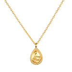 Shifting Consciousness Snake Necklace, an 18kt gold plated pendant featuring a delicate snake design; perfect for spiritual jewelry and meditation practices. This necklace embodies renewal and meaning, making it a great talisman for manifestation, protection, and yoga.