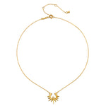 Gold-toned chain necklace with sun pendant and adjustable clasp closure.