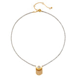 The Scattering Stardust Labradorite Moon Fringe Necklace, featuring a crescent moon design with layered golden chains, embodies spiritual elegance. Perfect for those seeking connection through meditation and meaningful jewelry, this piece resonates with energies of protection from the sun and moon, making it a wonderful talisman for manifestation.