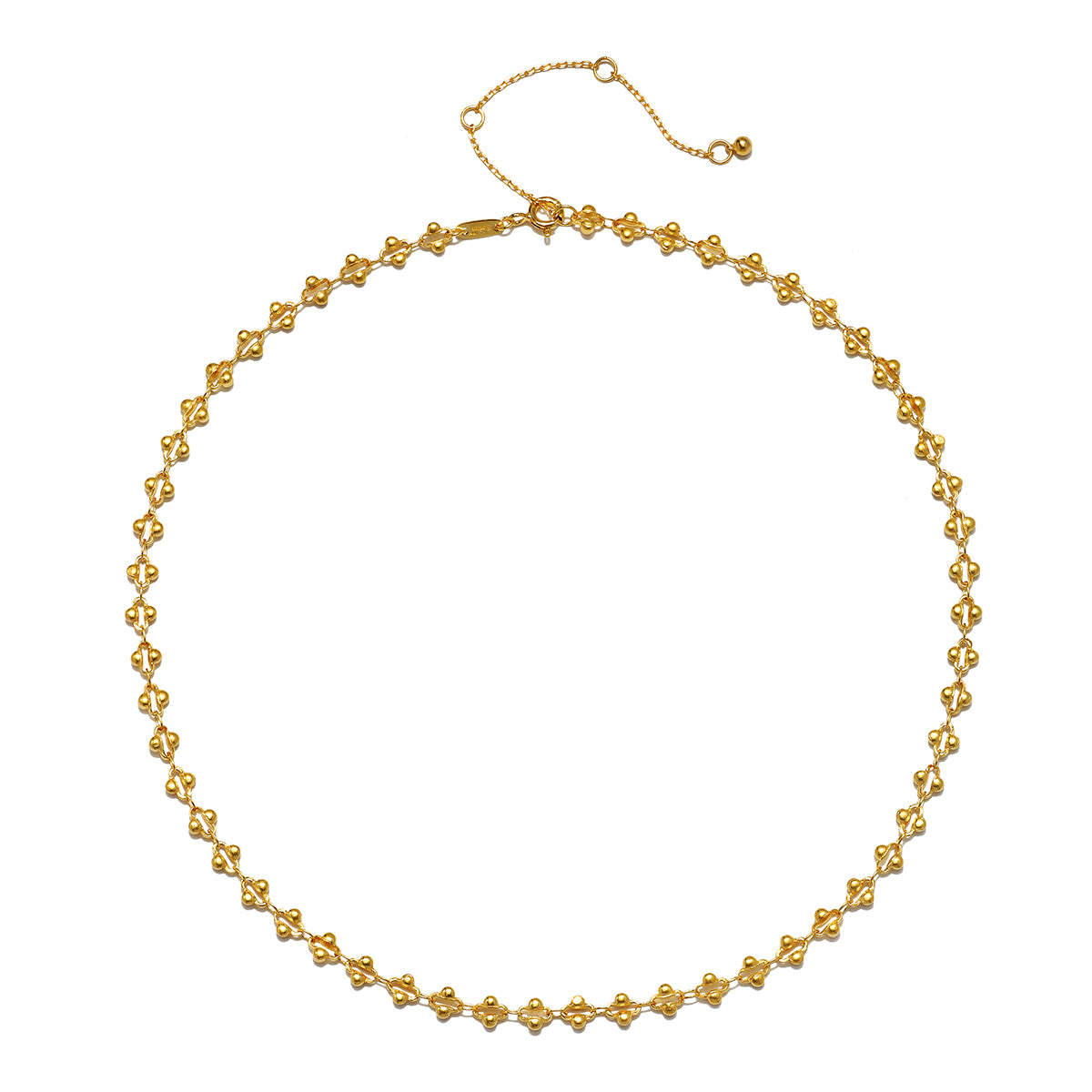The Golden Hour Coin Chain Necklace displayed on a white background, highlighting its intricate link design and elegant gold finish. This spiritual jewelry item resonates with the concepts of meaning and manifestation, making it a great addition to any zodiac-themed collection or meditation practice.