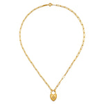 The Love Everlasting Padlock Heart Necklace displayed elegantly, showcasing its heart-shaped charm with white topaz on a delicate chain. This necklace embodies the essence of spiritual jewelry, making it a beautiful talisman for yoga and meditation.