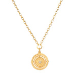 Infinite Devotion White Topaz Spinner Mandala Necklace showcased in a close-up view, emphasizing its intricate design and gold finish. This spiritual jewelry piece serves as a talisman for meditation, symbolizing protection and meaningful manifestation, connecting with the essence of the sun and moon.