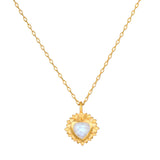 Journey to Love Moonstone Lotus Heart Necklace designed with a heart-shaped moonstone centerpiece, symbolizing love and transformation, perfect for those seeking spiritual jewelry and meditation support. Ideal talisman for manifesting love and positivity during yoga or mindfulness practices.