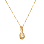 Love Potion Lotus Vessel Necklace featuring a beautifully crafted golden pendant, symbolizing abundance and transformation, ideal for spiritual jewelry, meditation, and manifestation. This piece is perfect for yoga enthusiasts seeking meaningful talismans focused on the sun and moon.