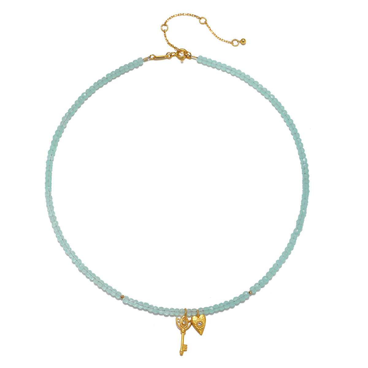 Love Unlocked Chalcedony Beaded Key Heart Necklace displayed elegantly, featuring charming elements of chalcedony and gold. This spiritual jewelry piece is perfect for those seeking a meaningful talisman, ideal for meditation, yoga, and empowerment through manifestation.