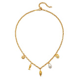 Gold chain necklace with shell, fish, sun, and pearl charms hanging from center.