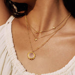 Wear the Unlimited Compassion Rose Quartz Gemstone Necklace layered with other delicate gold chains, creating a stylish spiritual look, perfect for meditation and representing love and compassion, making it a meaningful talisman for zodiac lovers.