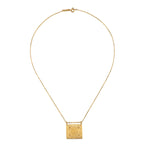 The Sacred Commencement Lotus Necklace on a plain background, highlighting its intricate design and 18k gold plating, a beautiful talisman for manifestation and spiritual protection.