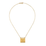 The Sacred Commencement Lotus Necklace on a plain background, highlighting its intricate design and 18k gold plating, a beautiful talisman for manifestation and spiritual protection.