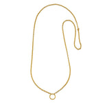 Gold chain necklace with small circular pendant loop at center bottom.