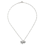 The Elephant Love Silver Necklace displayed elegantly on a flat surface, showcasing its detailed craftsmanship. This spiritual jewelry serves as a talisman for love and good fortune, ideal for those seeking meaningful accessories for meditation.