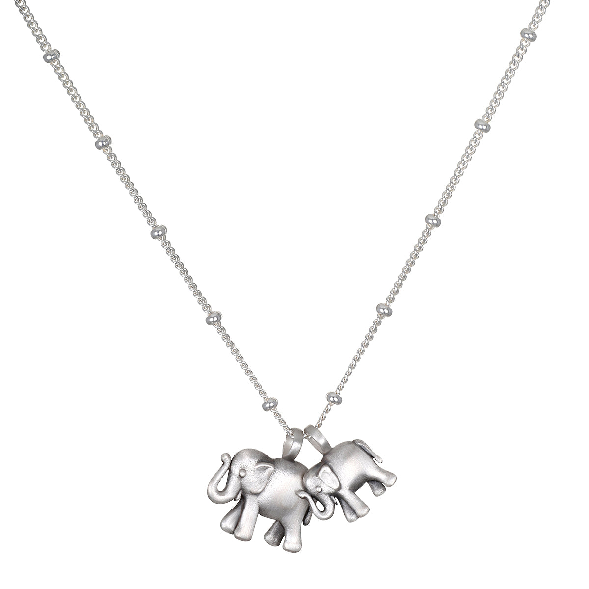 Elephant Love Silver Necklace featuring two intricately designed sterling silver elephants on a delicate chain, symbolizing strength, wisdom, and good fortune. This spiritual jewelry is perfect for meditation and serves as a meaningful talisman. Ideal for yoga practitioners and those interested in manifestations of charm and protection.