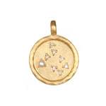 Zodiac Coin Charm embellished with a soothing pearl, representing innocence and beauty, a meaningful addition to any spiritual jewelry collection for manifestation and protection.