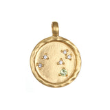 Zodiac Coin Charm with a green gemstone, representing harmony and balance, suitable for spiritual jewelry and meditation. A meaningful talisman for zodiac signs, enhancing protection, and focusing on manifestation during yoga.