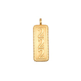 Gold-toned rectangular charm with numbers 2, 2, 2 vertically engraved and a decorative beaded border.