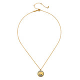 A thin gold chain necklace with an adjustable extender holds a round pendant featuring a gold elephant on a dark background.