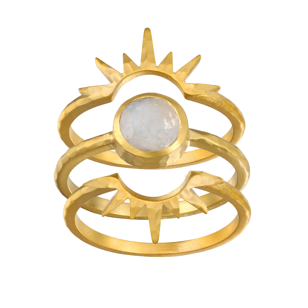 Close-up of the Light Seeker Moonstone Starburst Nested Ring Set featuring gold rings with a central moonstone, symbolizing spiritual jewelry and talismans for meditation and protection. The starburst design embraces themes of the sun and moon, representing meaningful connections to manifestation, yoga, and zodiac inspiration.