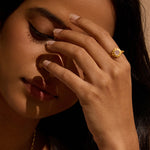 A close-up of a model wearing the Journey to Love Rose Quartz Lotus Heart Ring, showcasing the delicate design that embodies spiritual meaning and protection. Ideal for meditation and manifestation, this ring is a beautiful addition to any jewelry collection.