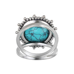 The back view of Nurture Your Voice Turquoise Silver Ring by Satya Jewelry, highlighting its unique design and craftsmanship, perfect for those who embrace the meaning and spirituality behind their jewelry choices for alignment with the sun and moon.