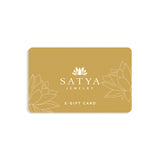 Elegant eGift Card design for SATYA Jewelry featuring a serene gold background with lotus patterns. Ideal for sharing meaningful gifts that embody spiritual jewelry values such as meditation, talisman energy, zodiac connections, and protection symbolism. Perfect for those seeking to manifest positivity and charm in their lives, aligning with yoga and spiritual practices.