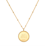 Pathway to Love Necklace in gold featuring an engraved message for the children of Manjushree. This charm serves as spiritual jewelry that embodies meanings of protection, meditation, and a connection to the zodiac, perfect for manifesting positive energy.