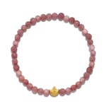 Healing Journey Rhodonite Stretch Bracelet featuring beautifully faceted rhodonite beads with a golden lotus flower accent, symbolizing new beginnings and spiritual growth. Ideal for meditation, this piece serves as a meaningful talisman for protection and manifestation, connecting the wearer to their inner journey and enhancing their yoga practice.