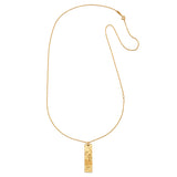 The Story of Aquarius Zodiac Necklace laid out elegantly, showcasing its intricate pendant design. This spiritual jewelry piece doubles as a protective talisman, embodying the zodiac sign and encouraging individuals on their yoga and meditation journeys towards self-actualization and creativity.