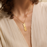 A model wearing the Story of Cancer Zodiac Necklace, highlighting its elegant design. This spiritual jewelry resonates with the energies of zodiac signs, promoting meditation and offering a meaningful symbol of protection, sun, moon, and spirituality.