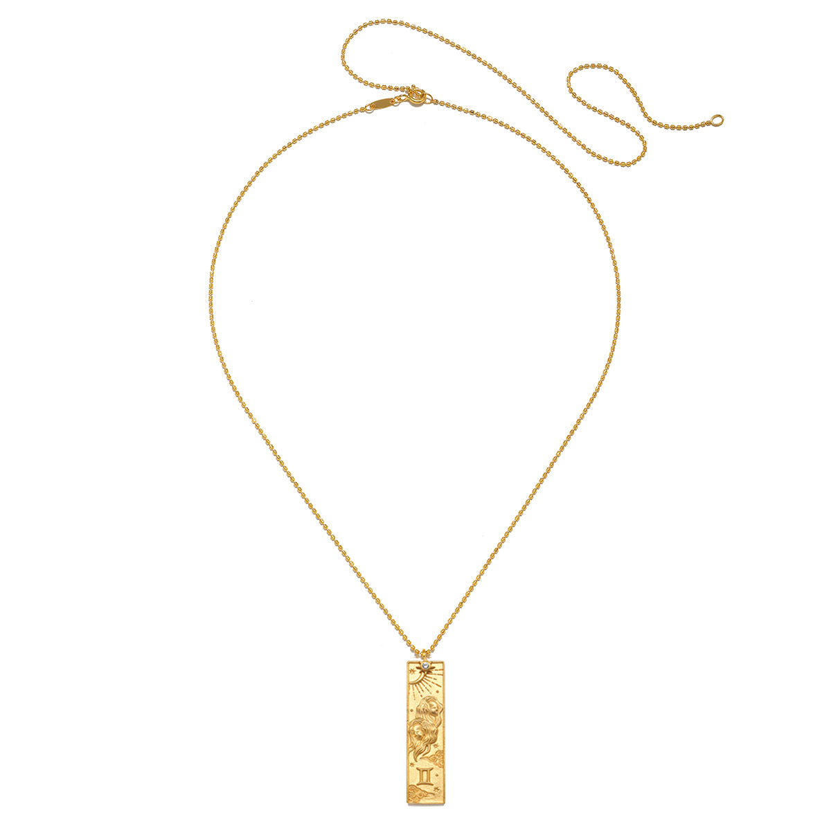 The Story of Gemini Zodiac Necklace displayed elegantly, emphasizing its significance as a talisman for protection and connection to the sun and moon energies in your spiritual practice.