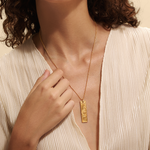 A person wearing the Story of Scorpio Zodiac Necklace, illustrating its elegant design and connection to the spiritual realm. This piece serves as a beautiful talisman, blending the power of zodiac symbolism with meditation, protection, and meaningful expression for spiritual seekers.