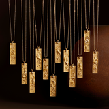 Various Story of Capricorn Zodiac Necklaces hanging beautifully, representing spiritual jewelry that resonates with the meanings of zodiac signs. These pieces are perfect for meditation, talismans for protection, and symbols of charm in yoga practices.