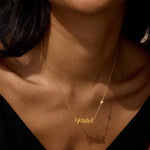 Close-up of the Gemini Expression Zodiac Script Necklace worn elegantly, showcasing its charm as a talisman for meaningful conversations and spiritual growth.