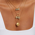 A close-up of the Sacred Sisterhood Constellation Necklace paired with other unique gold jewelry pieces, illustrating a harmonious blend of spiritual jewelry that carries deeper meanings. This necklace serves as a symbolic amulet for those seeking connection in their meditation and yoga practice, enriching your collection with protective and sacred elements.