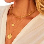 Close-up of the Mini Mandala Necklace displayed on a model, exuding a sense of spiritual elegance. Ideal as a meaningful gift for yoga practitioners, this necklace serves as a protective amulet rich with symbolism and significance.