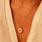 A relaxed look at the Unlimited Compassion Rose Quartz Gemstone Necklace, worn elegantly, embodying spiritual significance and protection, making it a wonderful addition to any soulful collection, especially for those into wellness and meditation.