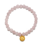 Awaken Love Mandala Rose Quartz Gemstone Bracelet featuring faceted rose quartz beads and a golden mandala charm, embodying spiritual jewelry ideals of love and compassion, perfect for meditation and as a talisman for meaningful manifestations in yoga and zodiac practices.