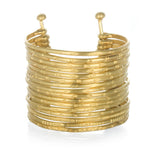 Gold Large Bangle Bracelet Cuff - Something Special features a stunning design that combines sixteen hand-stamped bangles into a single adjustable cuff, embodying spiritual jewelry and meaningful symbolism for meditation and yoga practices.