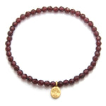 Tree of Life Garnet Gemstone Bracelet showcasing faceted garnet stones, symbolizing love and guidance. Perfect as spiritual jewelry for meditation gifts, this bracelet carries deep meaning and serves as a protective amulet for yoga and manifestation.